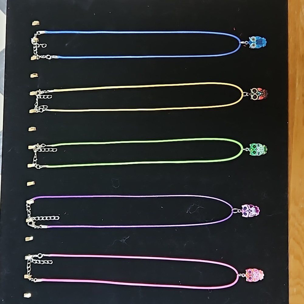 Lot of 5 owl necklaces on colorful cords